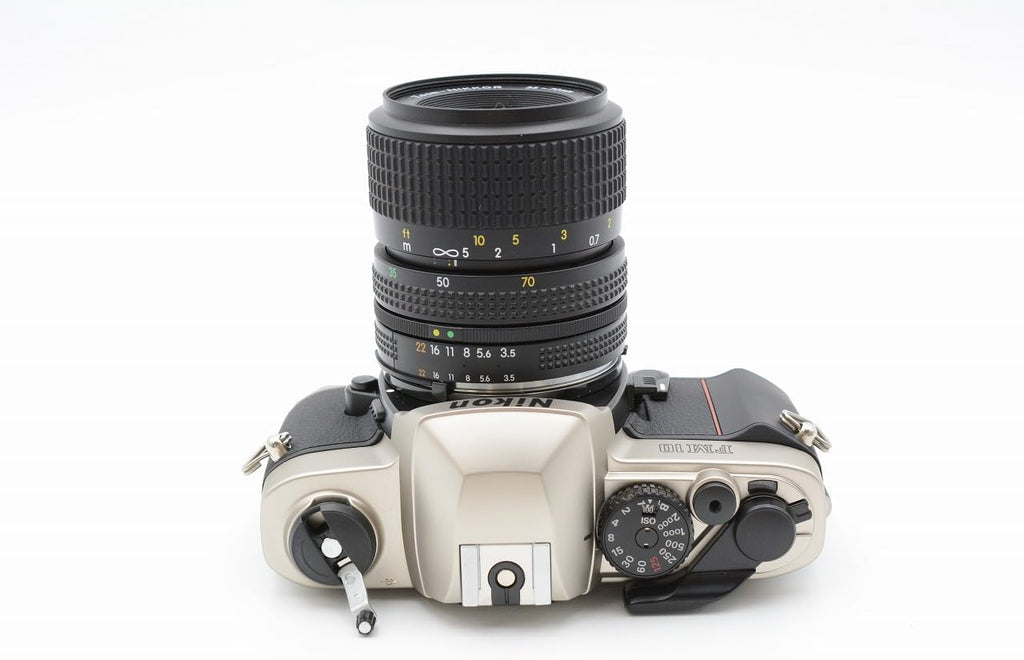 Nikon FM10 Digital SLR Camera Kit with Housing and AI Lens 35-70 mm F/3.5-4.8 Silver