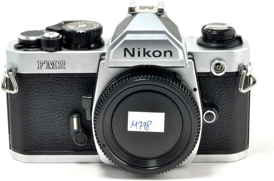 Nikon FM2 35MM SLR Film Camera with Titanium Shutter Manual focus FX Nikon Lens system (Renewed)
