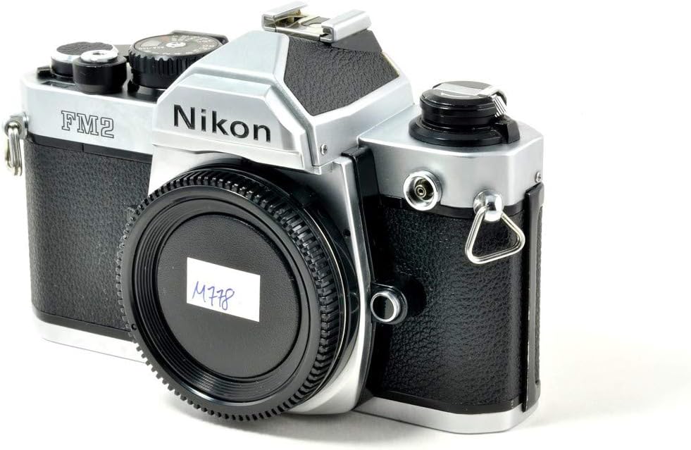 Nikon FM2 35MM SLR Film Camera with Titanium Shutter Manual focus FX Nikon Lens system (Renewed)