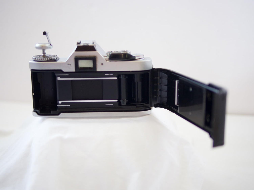 Canon AV-1 35mm SLR Camera with Canon FD Mount Lens, uses both Color & B&W 35MM film. (Renewed)