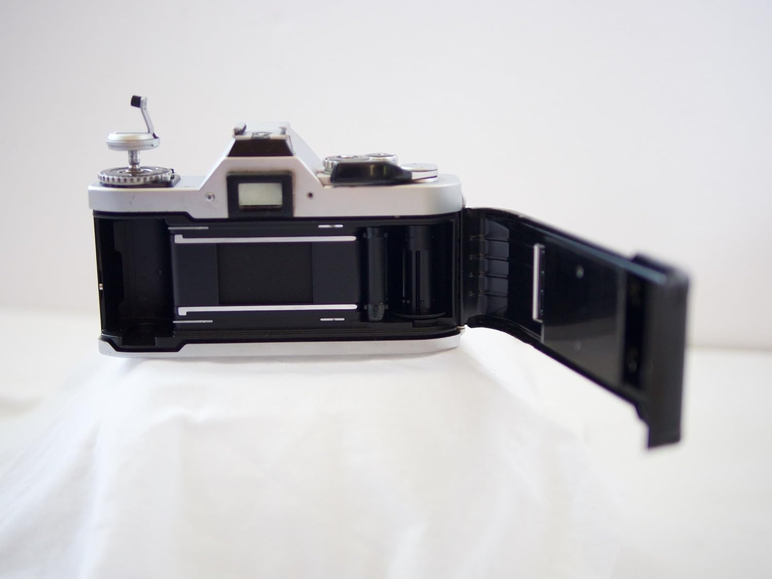 Canon AV-1 35mm SLR Camera with Canon FD Mount Lens, uses both Color & B&W 35MM film. (Renewed)
