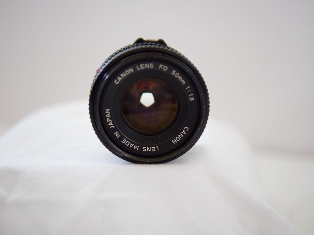Canon AV-1 35mm SLR Camera with Canon FD Mount Lens, uses both Color & B&W 35MM film. (Renewed)