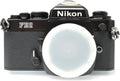 Nikon FE2 film SLR camera with black body; no lens