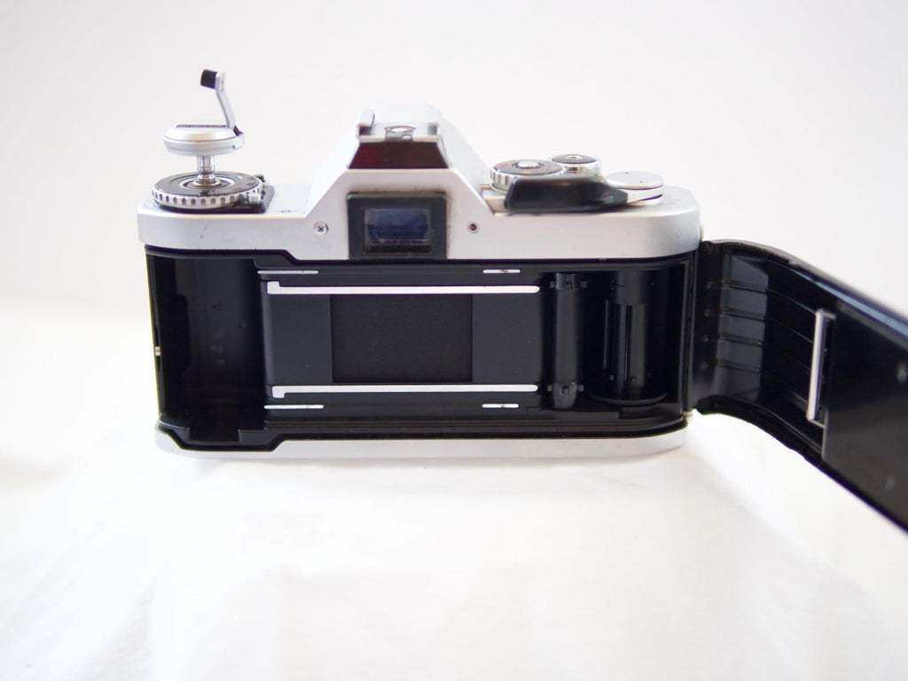 Canon AV-1 35mm SLR Camera with Canon FD Mount Lens, uses both Color & B&W 35MM film. (Renewed)