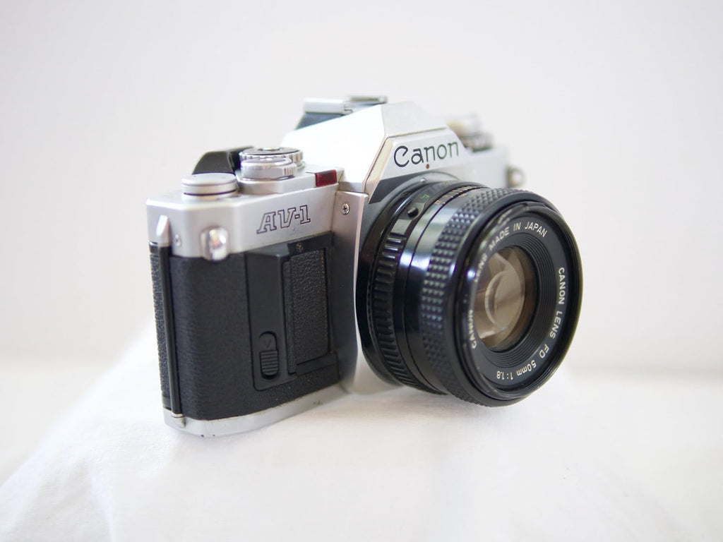 Canon AV-1 35mm SLR Camera with Canon FD Mount Lens, uses both Color & B&W 35MM film. (Renewed)