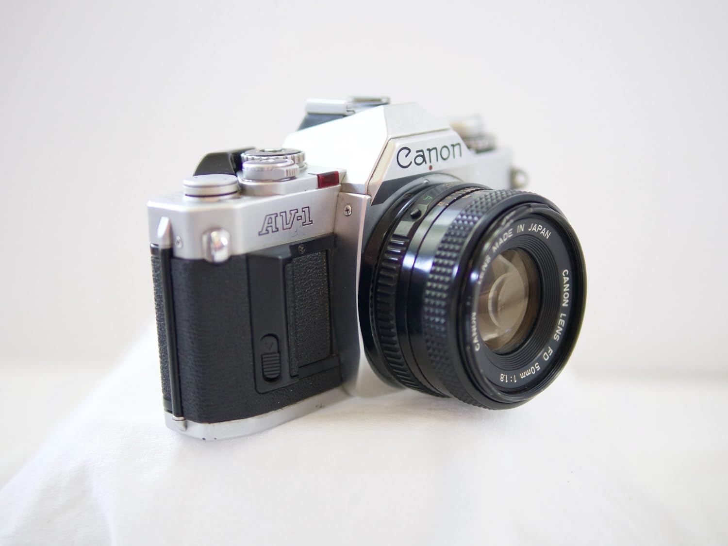 Canon AV-1 35mm SLR Camera with Canon FD Mount Lens, uses both Color & B&W 35MM film. (Renewed)
