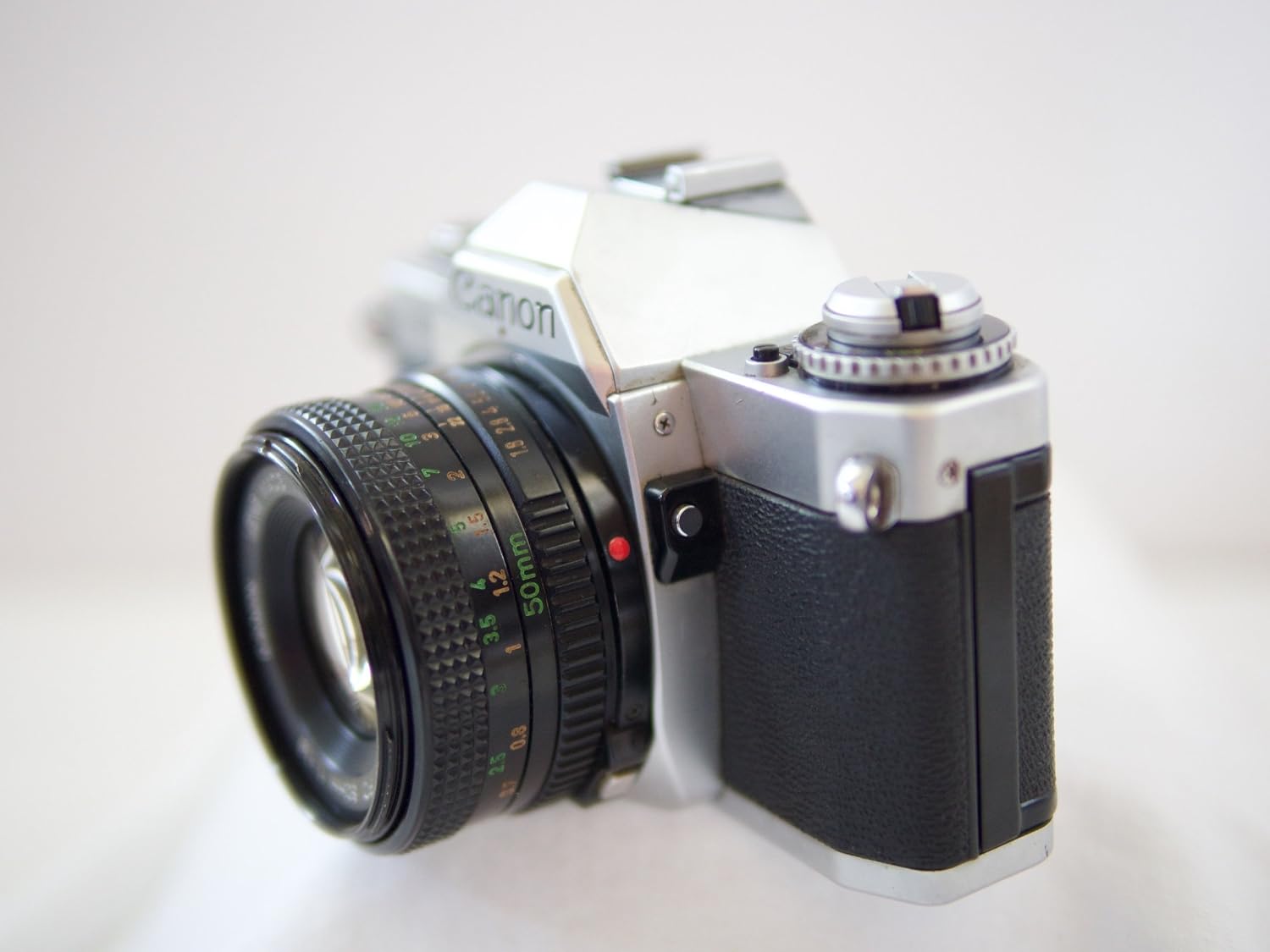 Canon AV-1 35mm SLR Camera with Canon FD Mount Lens, uses both Color & B&W 35MM film. (Renewed)