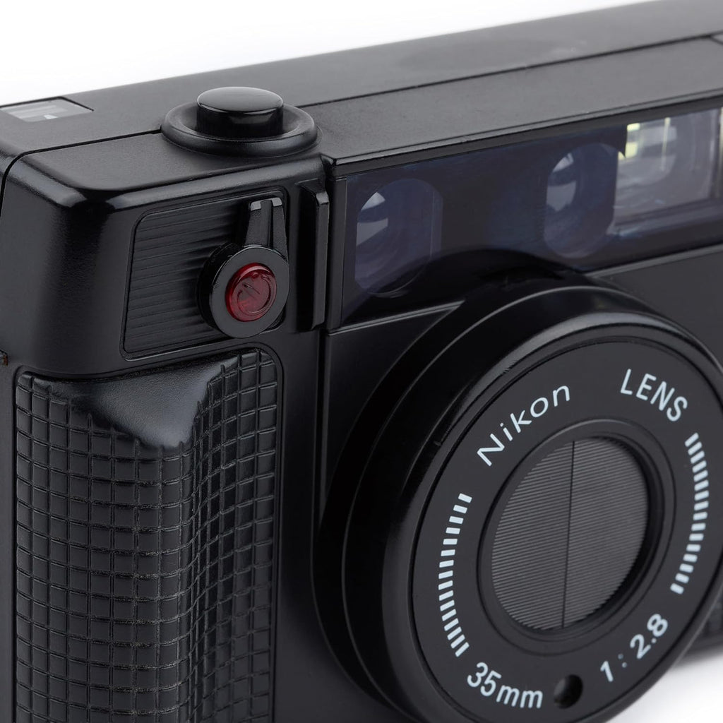 Nikon One Touch 35mm Point and Shoot Film Camera AKA L35AF II Built-in flash, Film loader, Nikon AF 35MM f2.8 lens (Renewed)