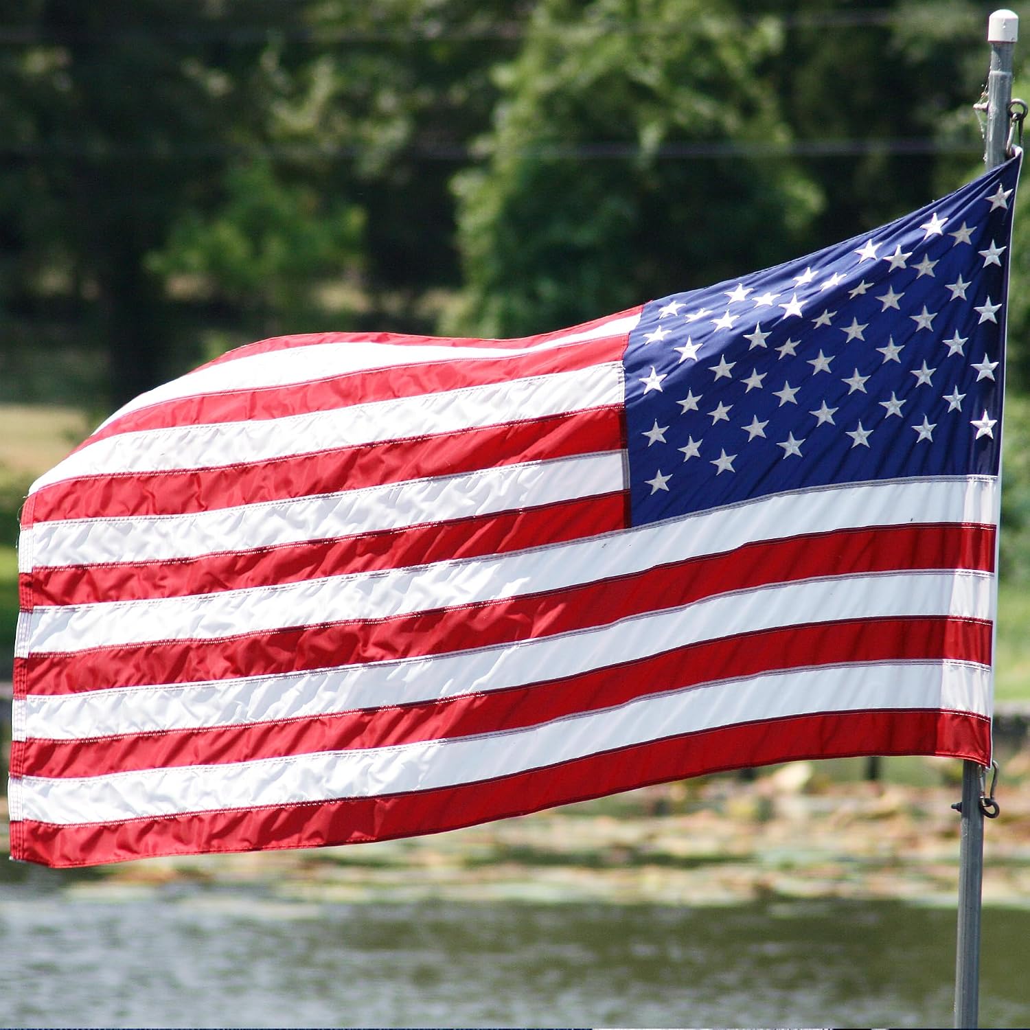 American Flag for Outside 12x18 Ft - TearProof Series Outdoor Use US Flags - Long Lasting, Fade Resistant - Thick Spun Polyester USA Banner - High Wind United States Flag - Embroidered Stars, Sewn Stripes, Brass Grommets