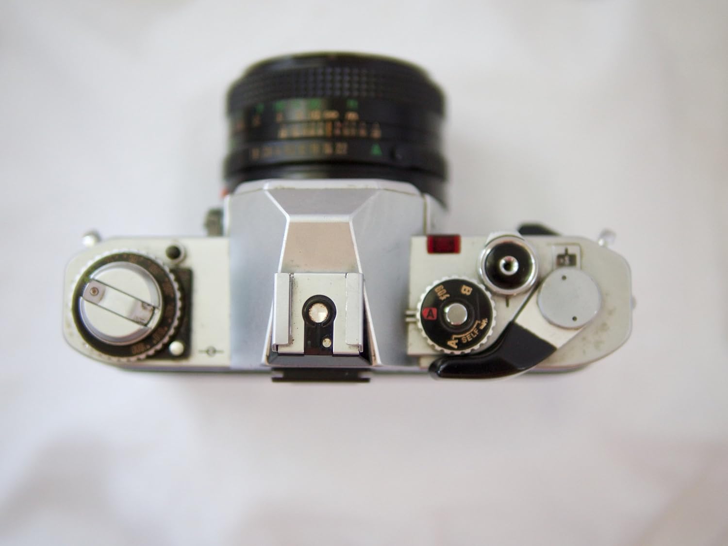 Canon AV-1 35mm SLR Camera with Canon FD Mount Lens, uses both Color & B&W 35MM film. (Renewed)
